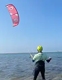 leer kitesurf nederlands