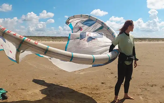 Kitesurf student holding kite for first kite lesson experience